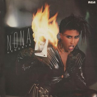 Nona Hendryx burning an old photograph of herself