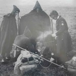 Members of the Kindred of the Kibbo Kift around the campfire