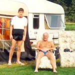 father and son wearing trunks