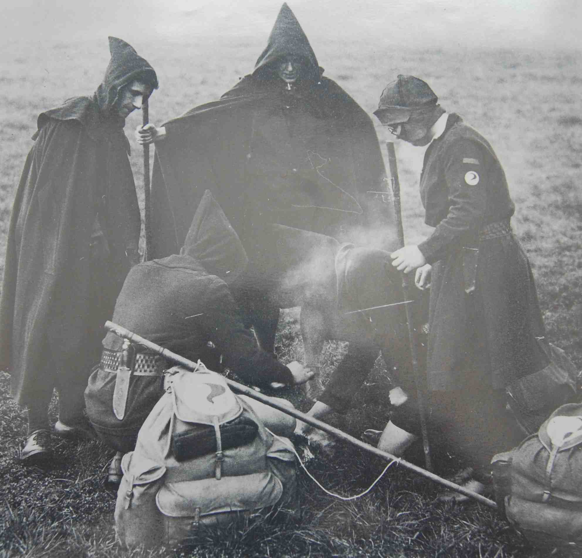 Members of the Kindred of the Kibbo Kift around the campfire